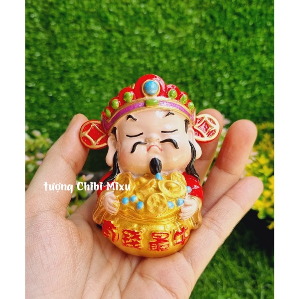 Tượng chibi Thần Tài may mắn 7cm mẫu ôm túi vàng