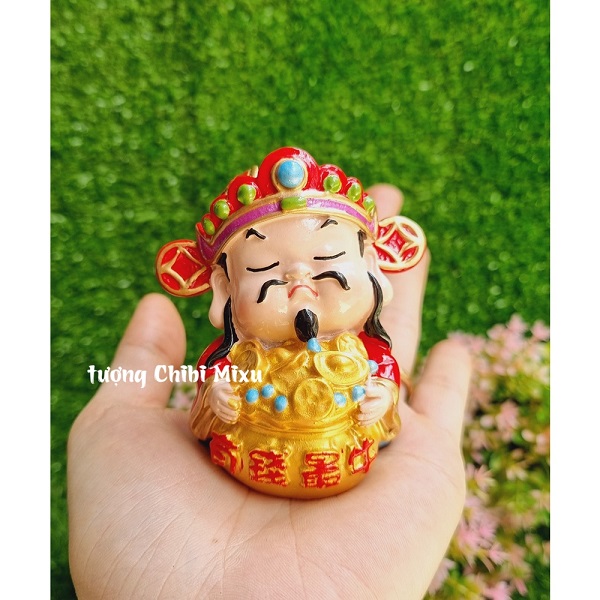 Tượng chibi Thần Tài may mắn 7cm mẫu ôm túi vàng